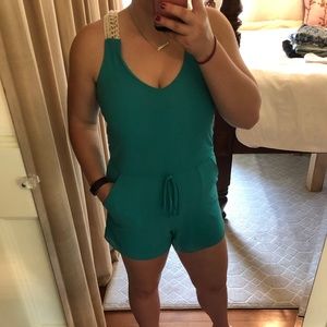 Torquiose romper with a rope razor back